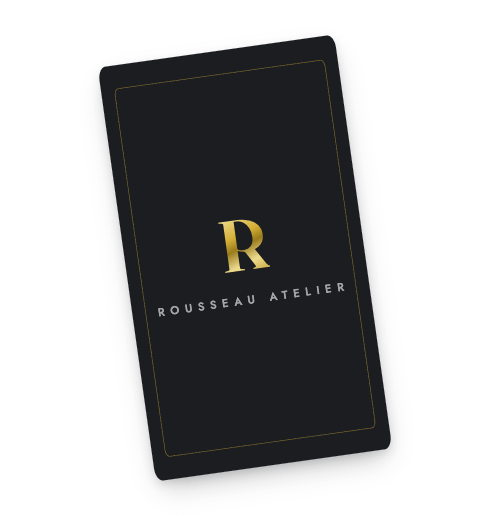 Black business card with gold foil monogram
